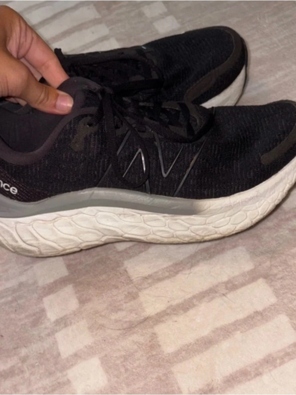 New Balance Black Athletic Running Shoes with White Midsole